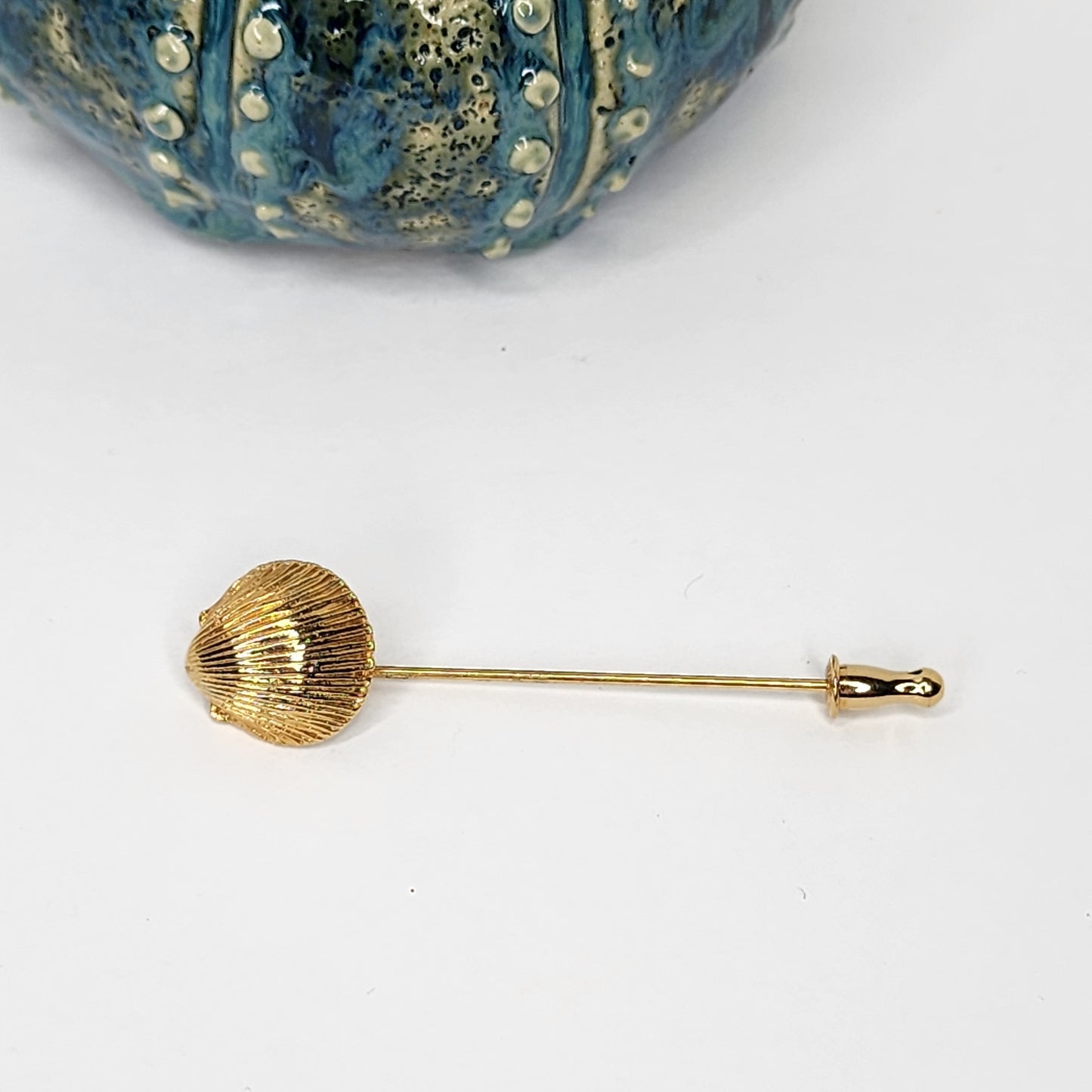 Vintage Monet Scalloped Seashell stick pin.