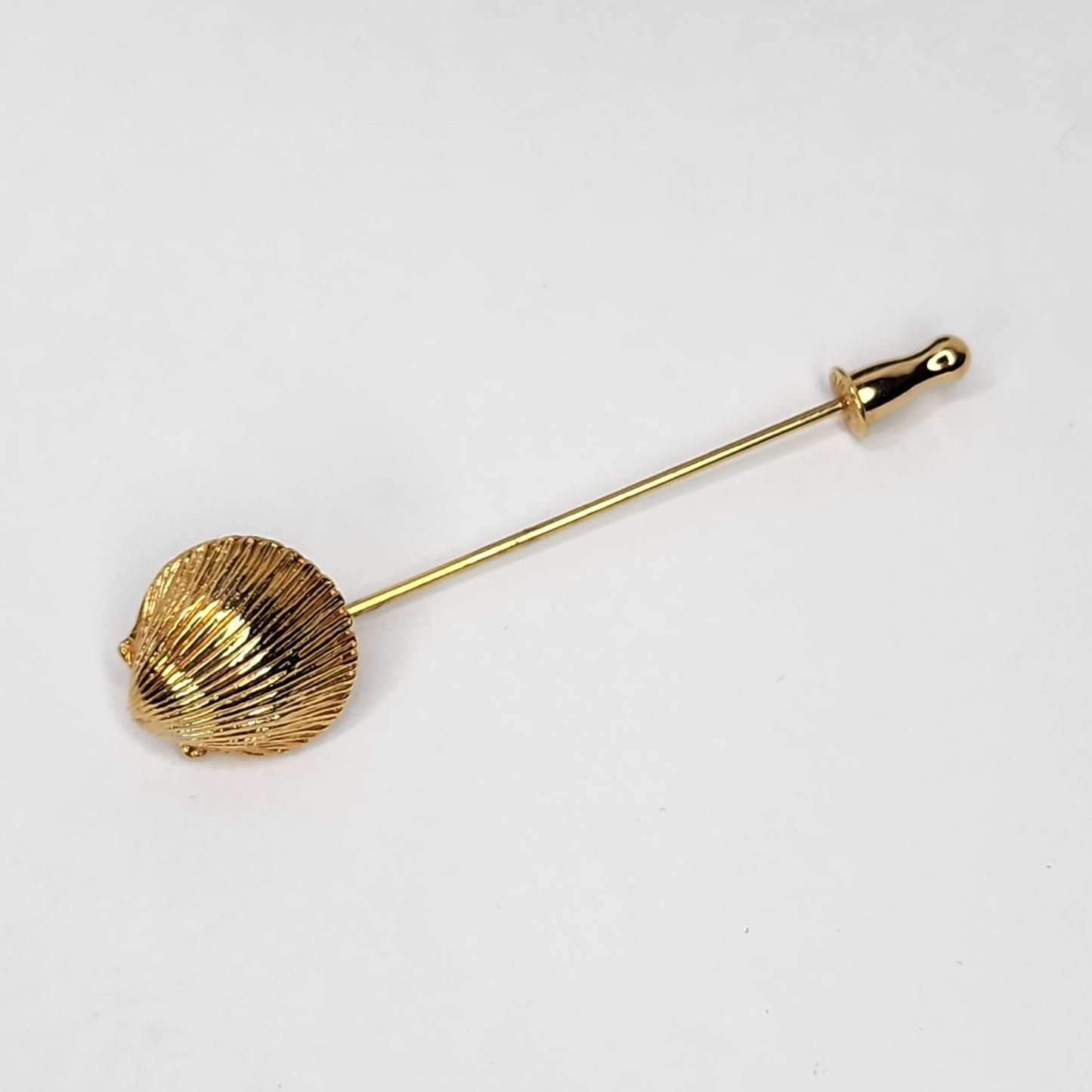 Vintage Monet Scalloped Seashell stick pin.