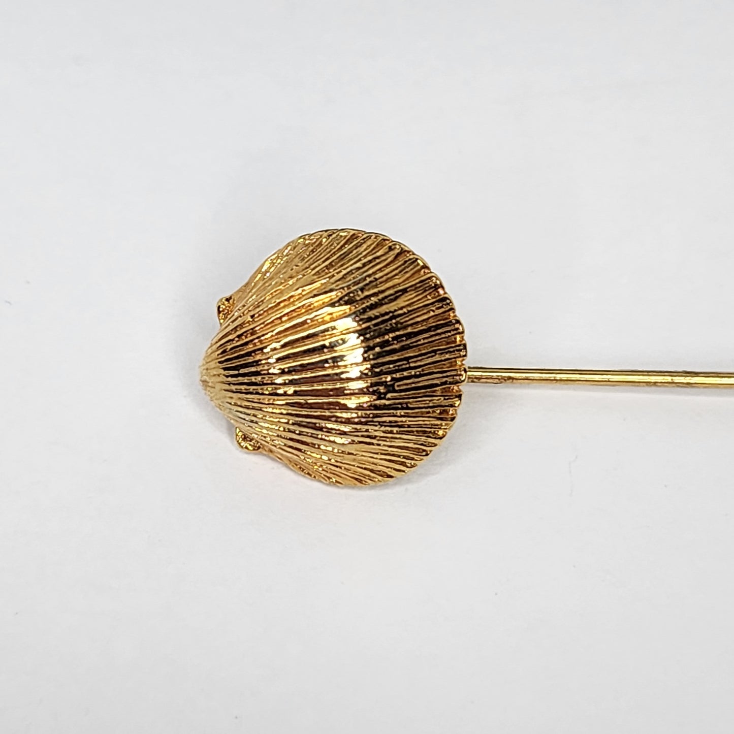 Vintage Monet Scalloped Seashell stick pin.