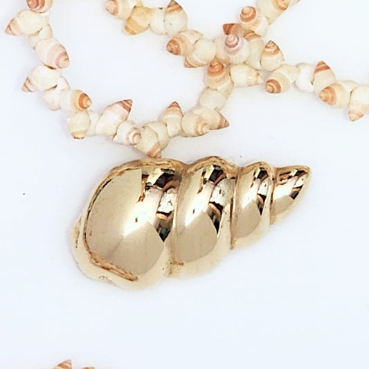 Vintage Sarah Coventry spiral seashell brooch pin