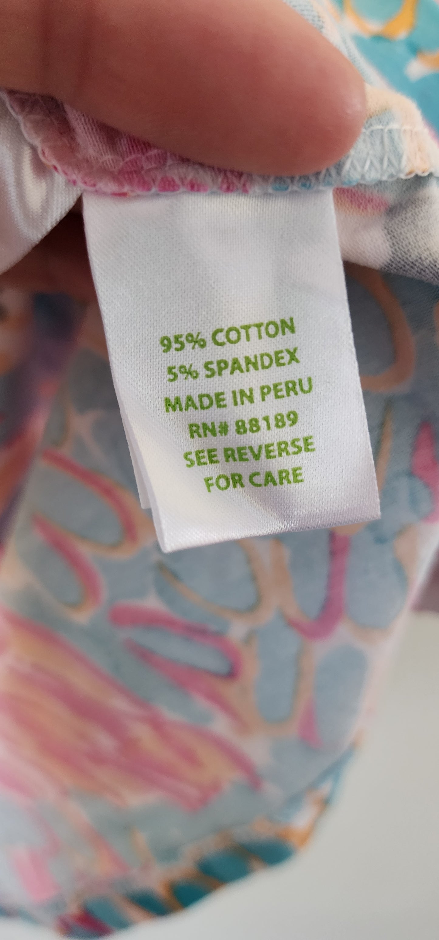 Lilly Pulitzer Michele Top in the "Peel n Eat" flamingo print.