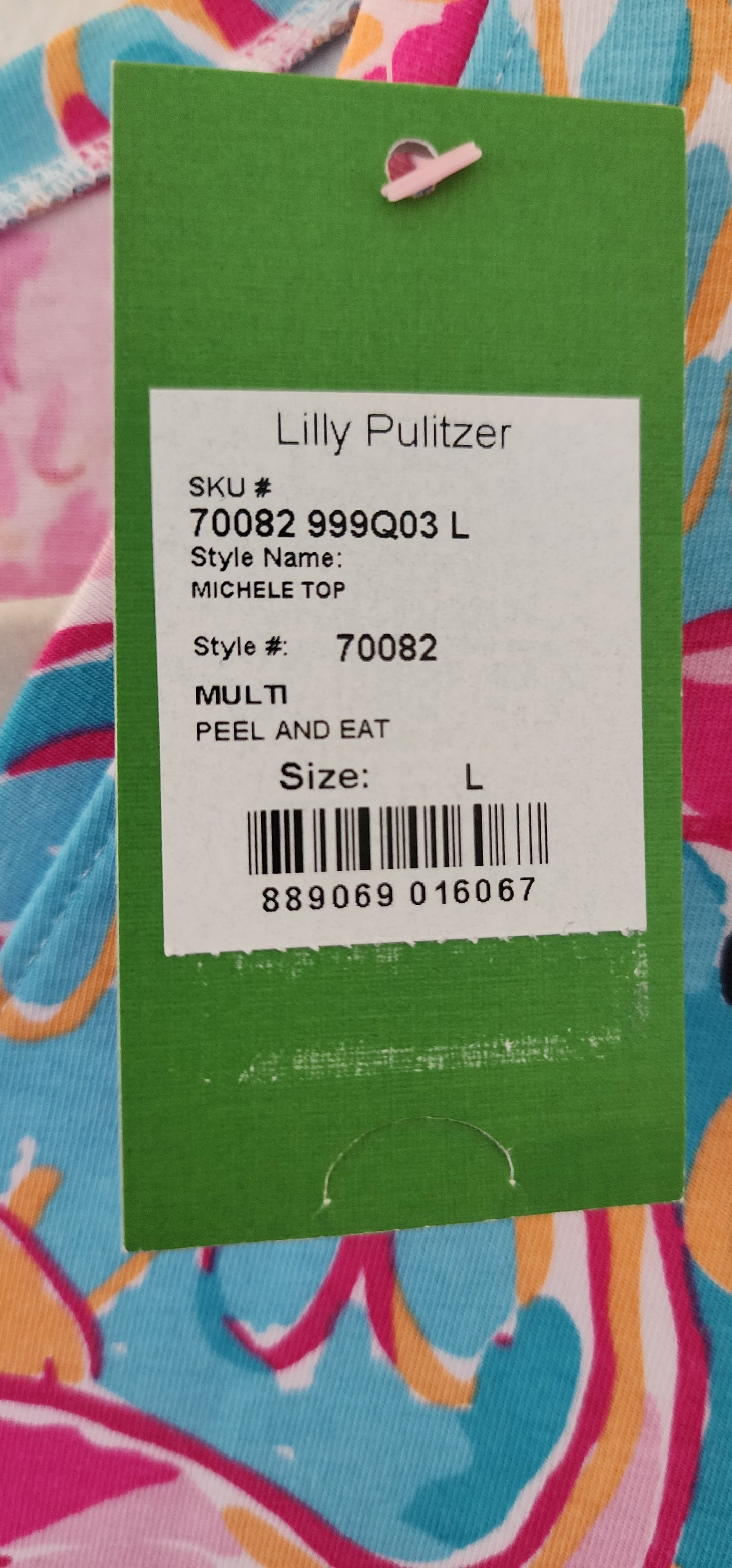 Lilly Pulitzer Michele Top in the "Peel n Eat" flamingo print.